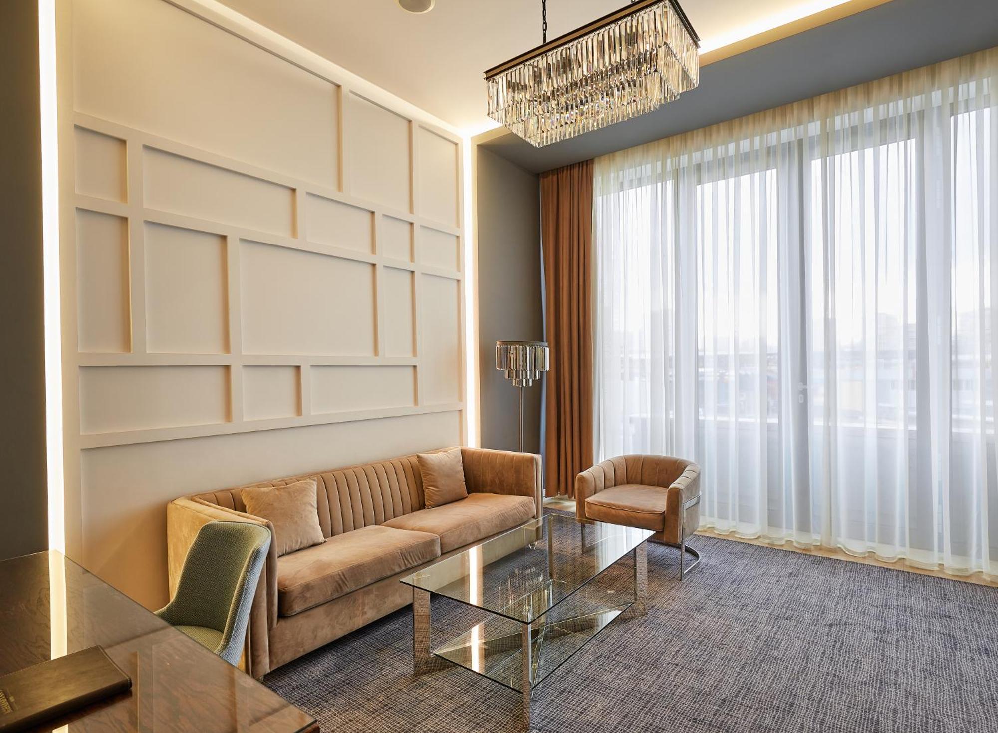 Aghababyan'S Hotel Erevan Exterior foto A living room in a suite at the hotel