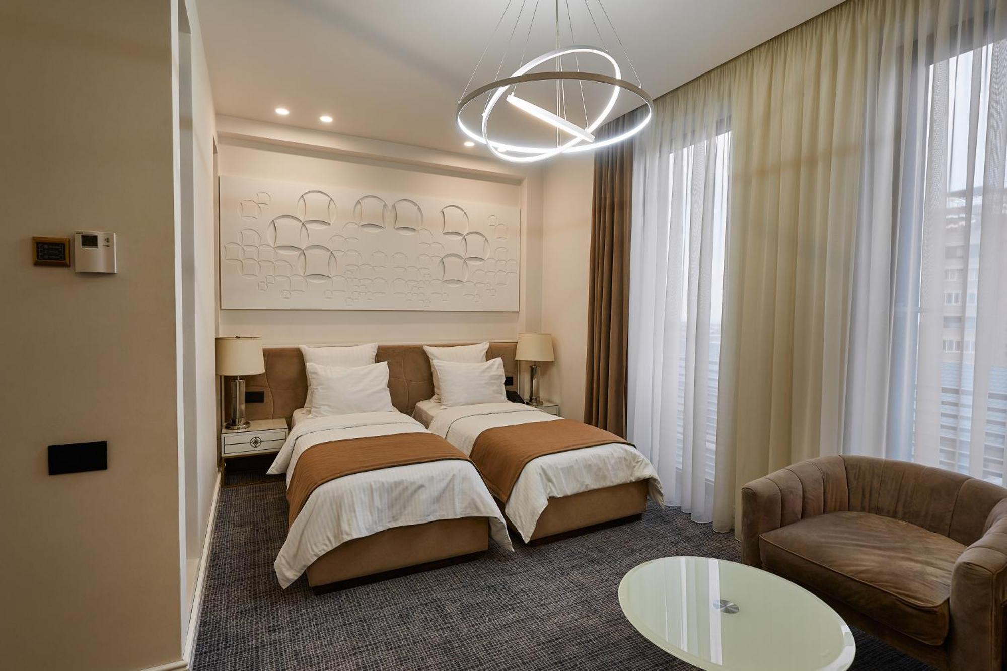 Aghababyan'S Hotel Erevan Quarto foto A room at the hotel