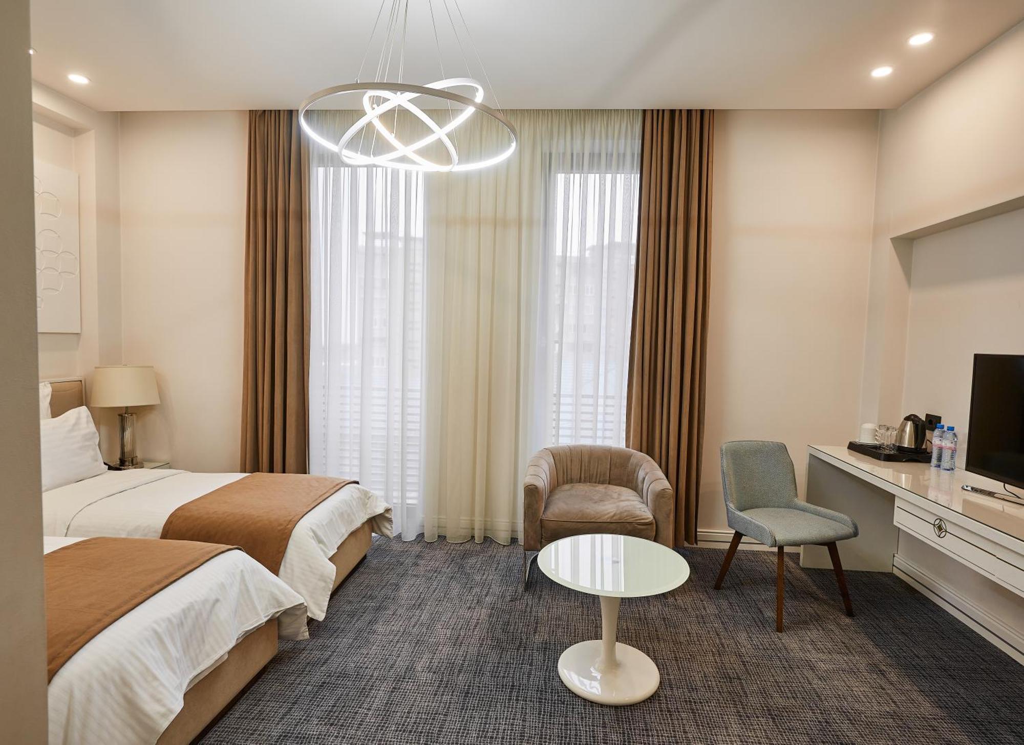 Aghababyan'S Hotel Erevan Quarto foto A room at the hotel