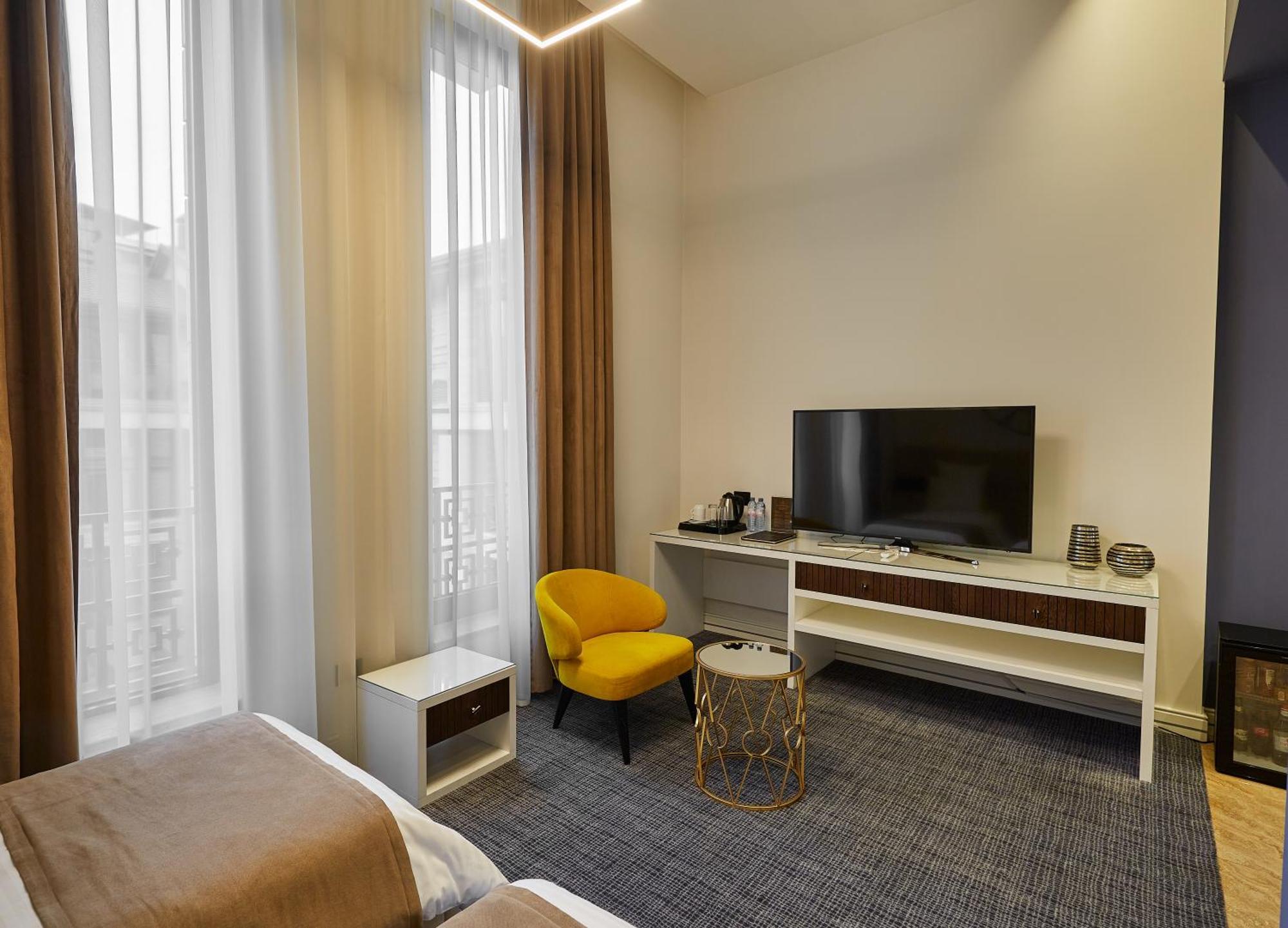 Aghababyan'S Hotel Erevan Quarto foto A room at the hotel